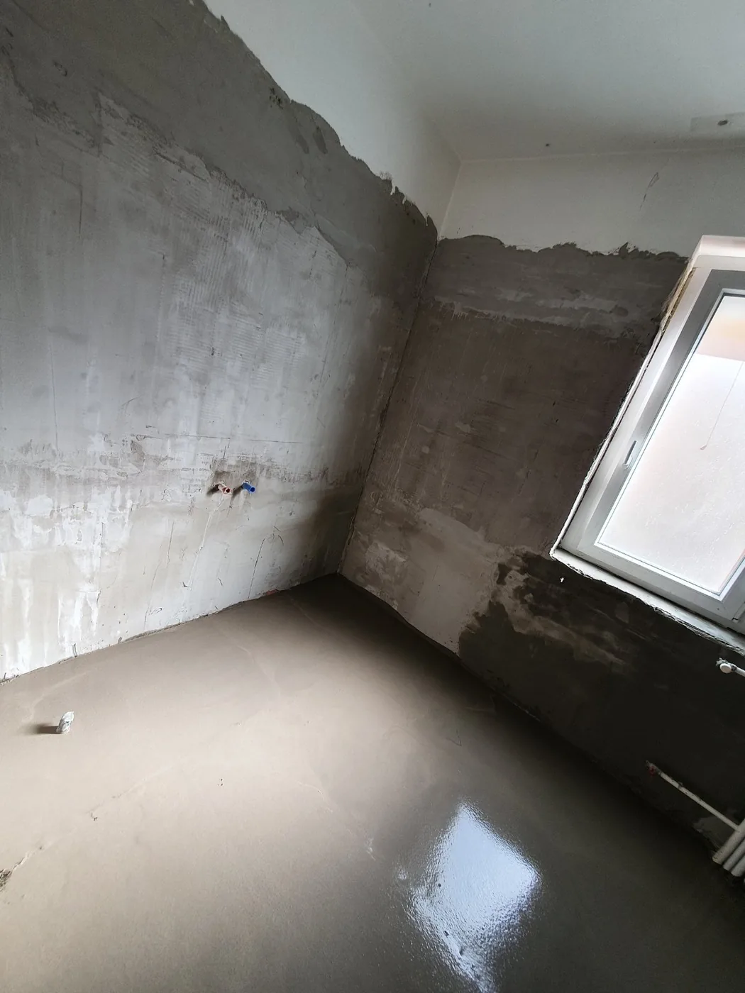 Prepared wall before painting. After skimming and sanding.